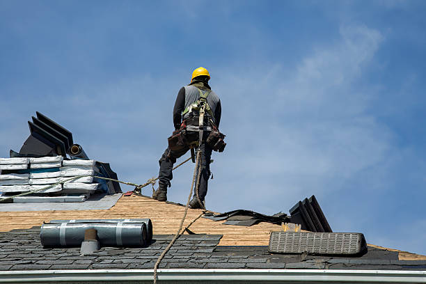Professional Roof Replacement technician working in Merrill, OR